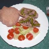 Minced pork and green beans stew in whole grain pita