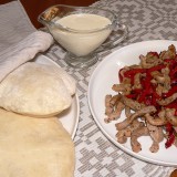 Peppered pork pitas with garlic spread